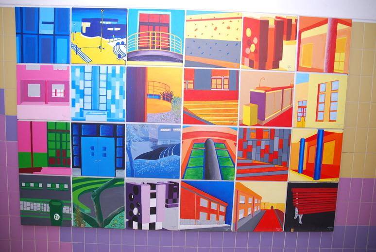 Colorful paintings depicting various architectural elements adorn the walls of Jardim de Infância de Telheiras.