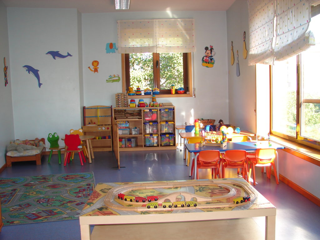 Preschool classroom with toys and children's furniture