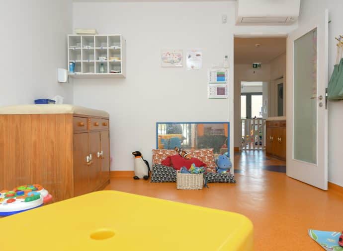 Preschool classroom with toys and furniture