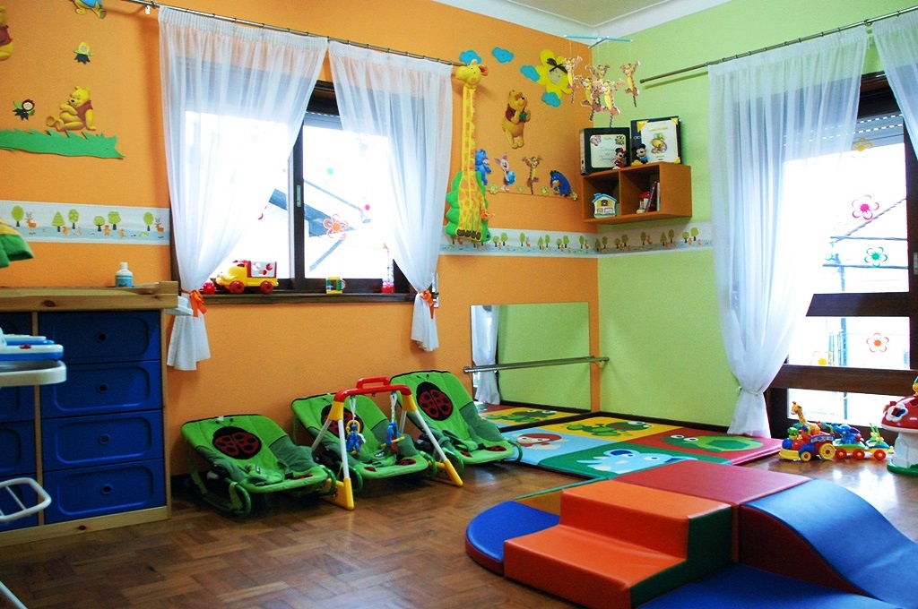 Preschool classroom with colorful furniture and toys