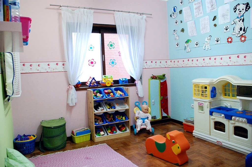 Preschool classroom with toys and colorful decorations
