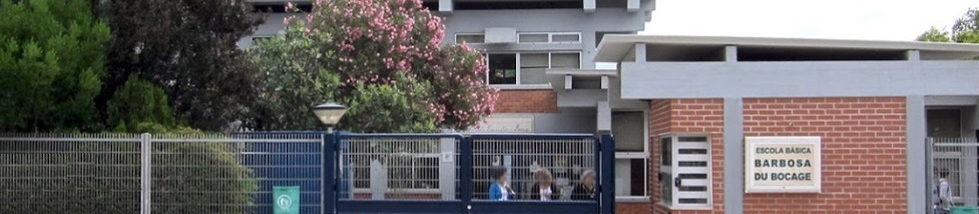 Exterior view of Escola Básica Barbosa du Bocage, showing the school building and gate.
