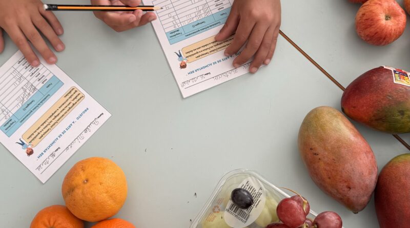 Preschool children participate in a healthy eating project, learning about different fruits and completing worksheets.