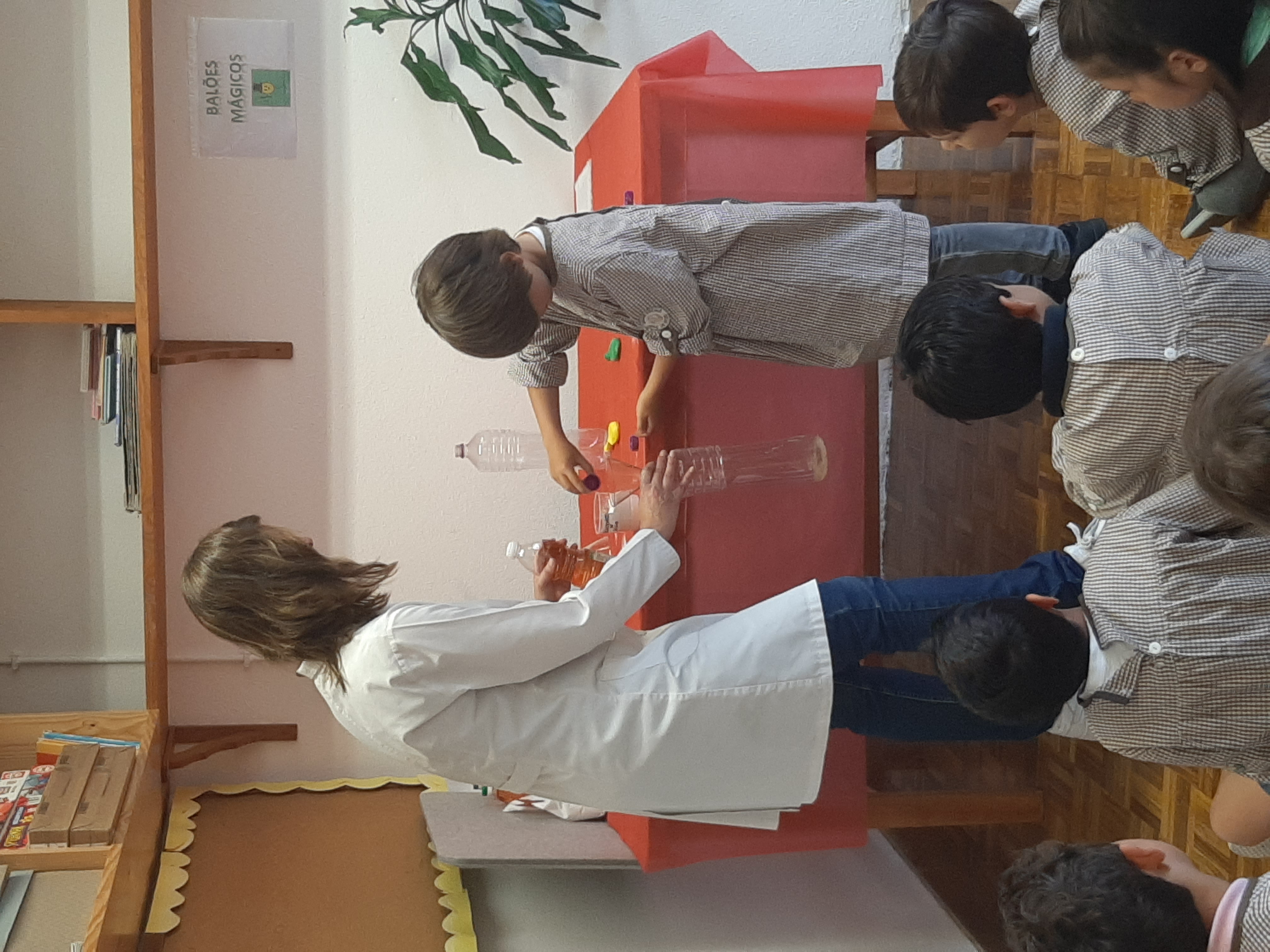 Preschool children participating in a science experiment