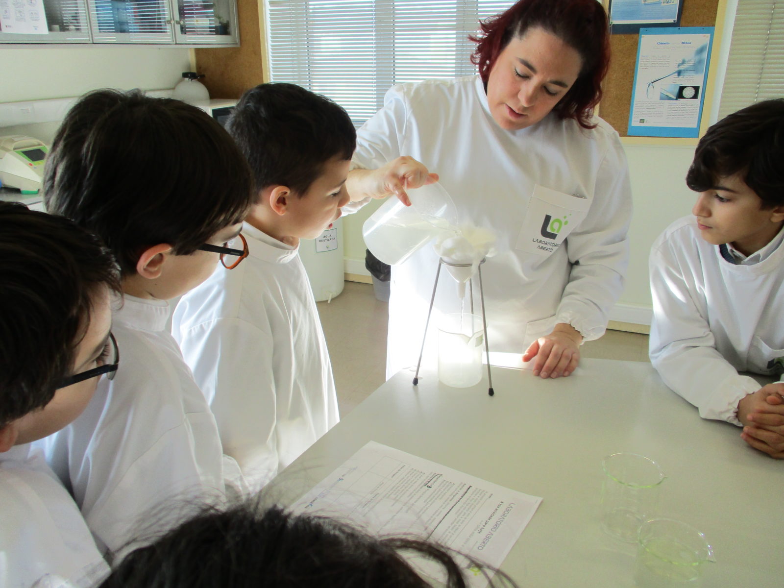 Preschool students participating in a science experiment