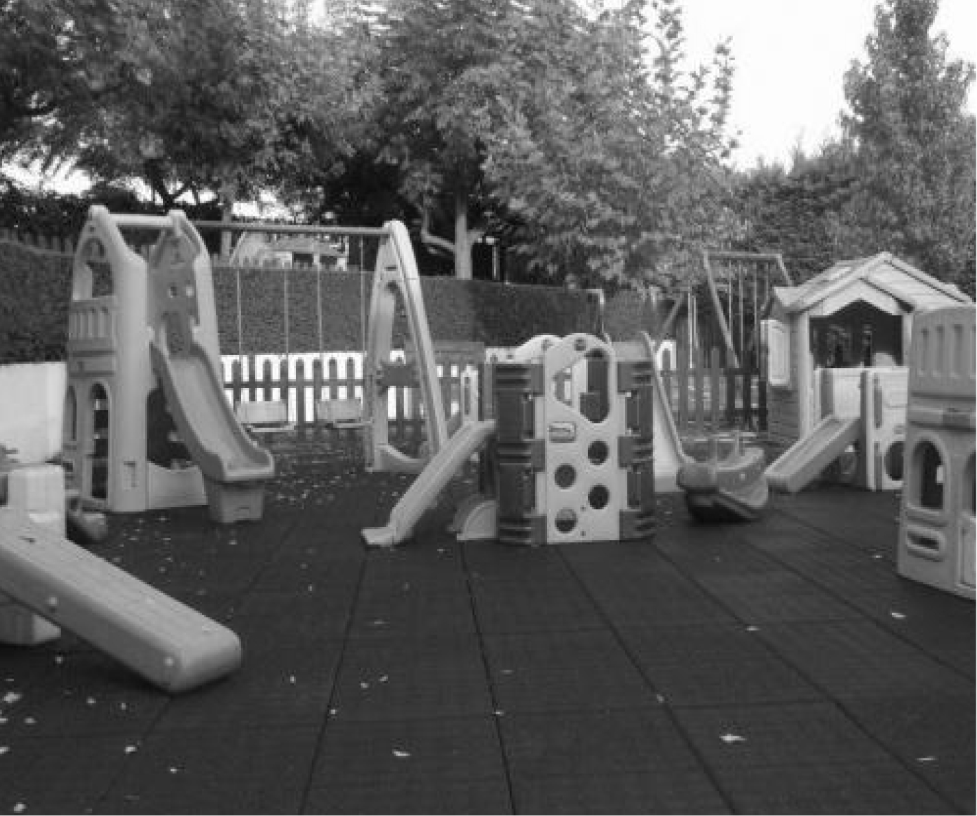 Preschool playground with slides and climbing structures
