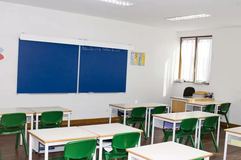 Classroom desks and chairs in a preschool or kindergarten classroom