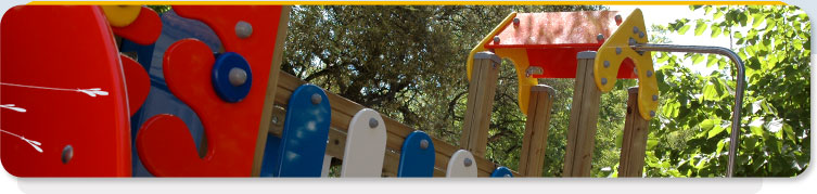Colorful playground equipment at Jardim Escola João de Deus - Estrela preschool.