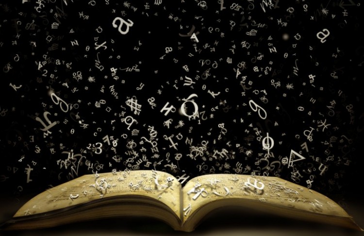 Open book with letters flying out of it