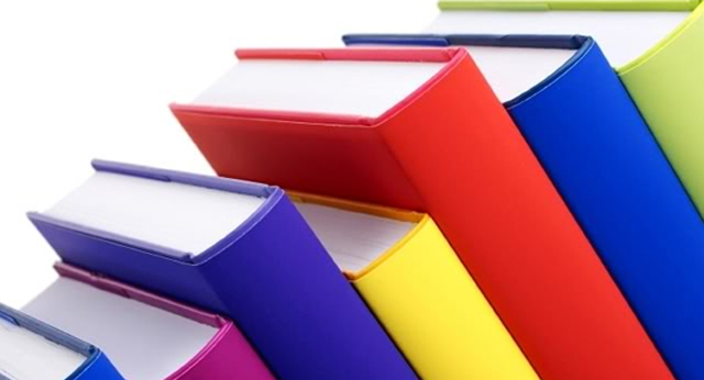Colorful books stacked on top of each other