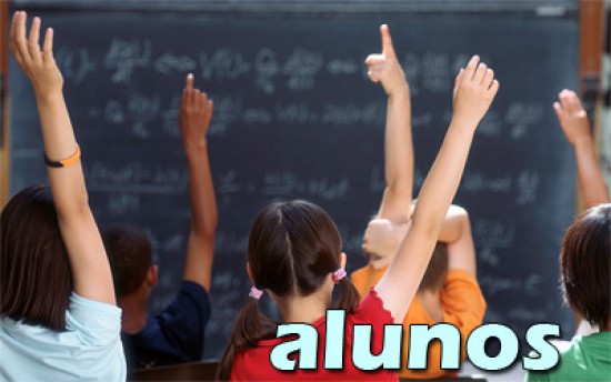 Students with their hands up in a classroom