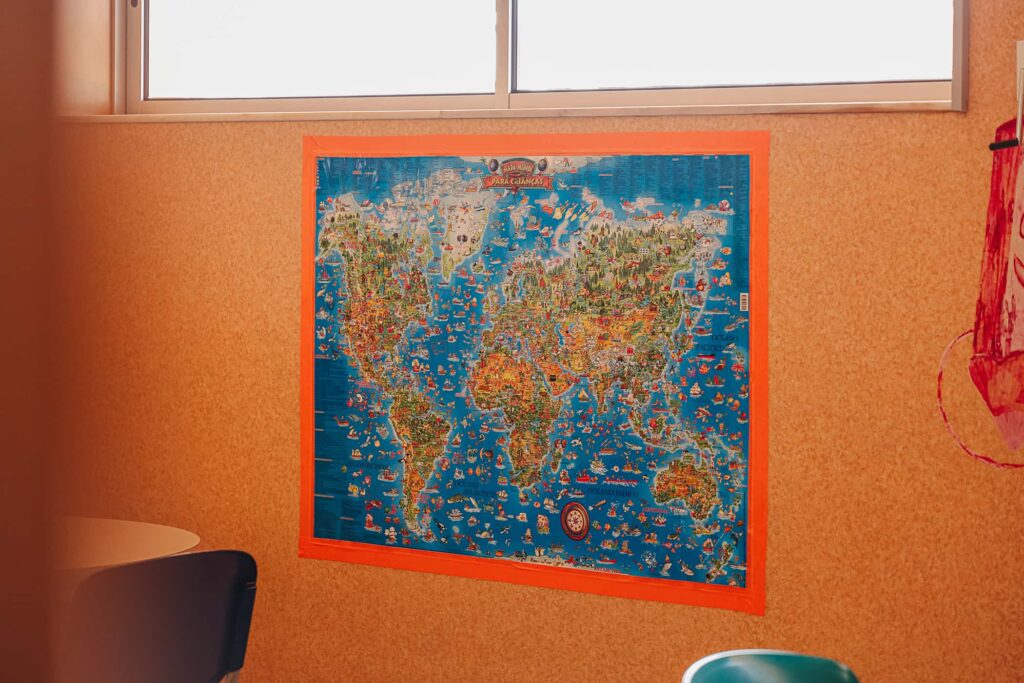 Colorful world map on classroom wall