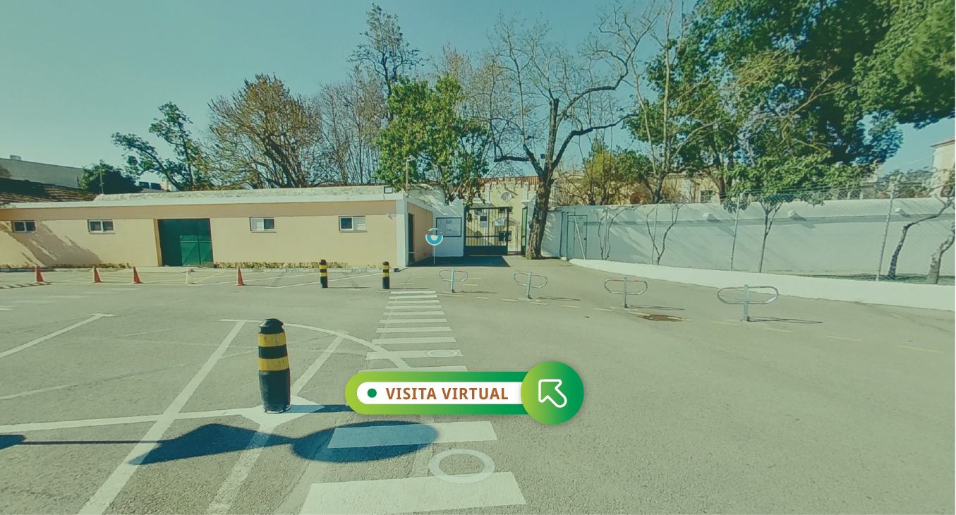 Exterior view of Externato Champagnat school showing the entrance and parking lot