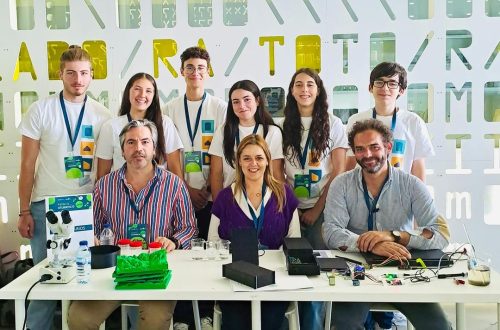 Students and teachers at Externato Camões participating in a science fair or competition