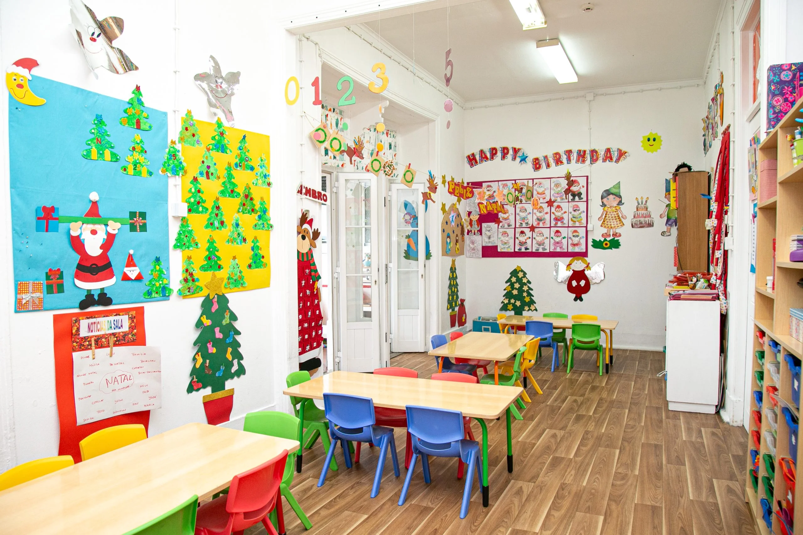 Preschool classroom with colorful furniture and decorations