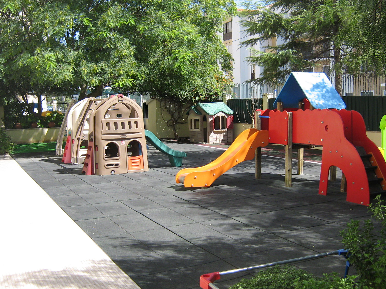 Preschool playground with colorful play structures