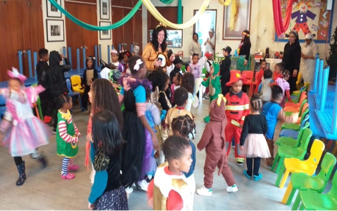 Preschool children in costumes at a carnival