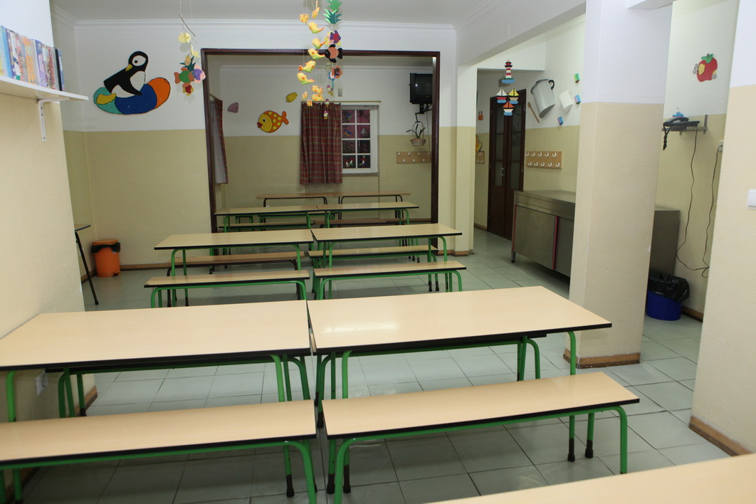 Preschool lunchroom with tables and chairs
