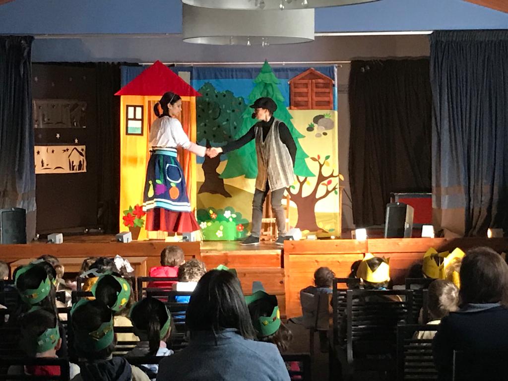 Preschool children watching a play on stage