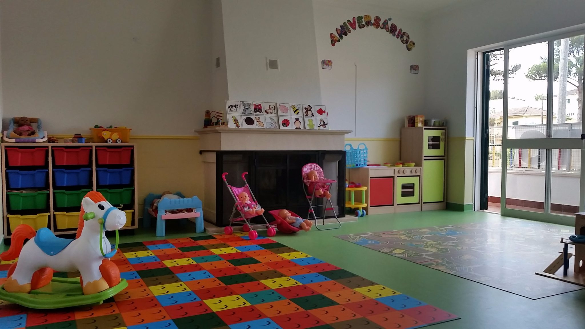 Preschool classroom with colorful toys and play area