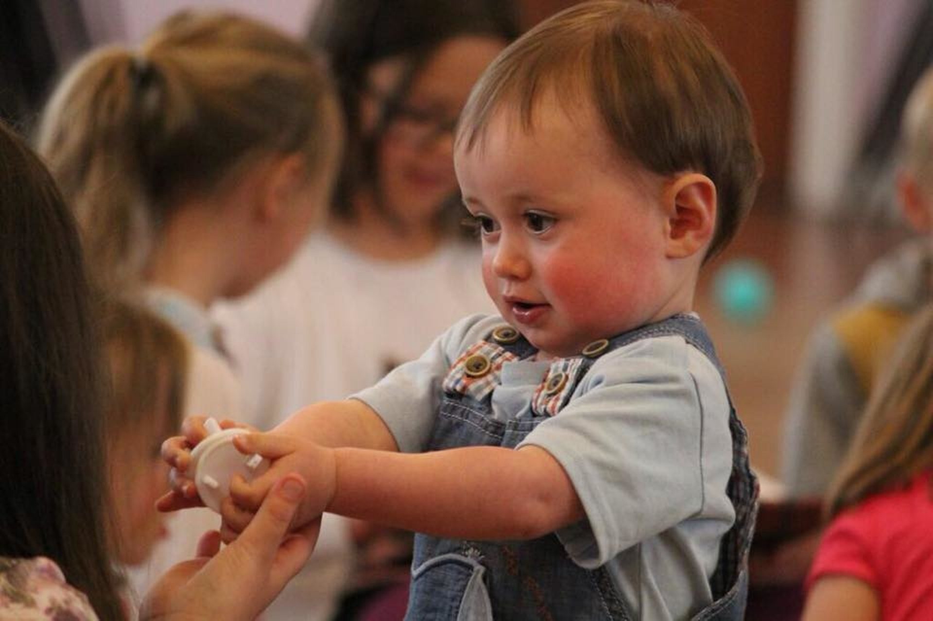 Preschool child playing with a toy