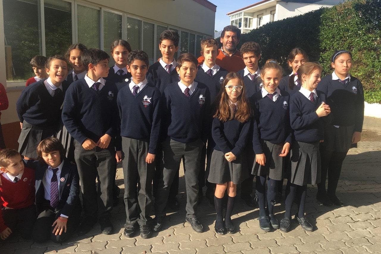 St. George's School students and teacher posing for a group photo