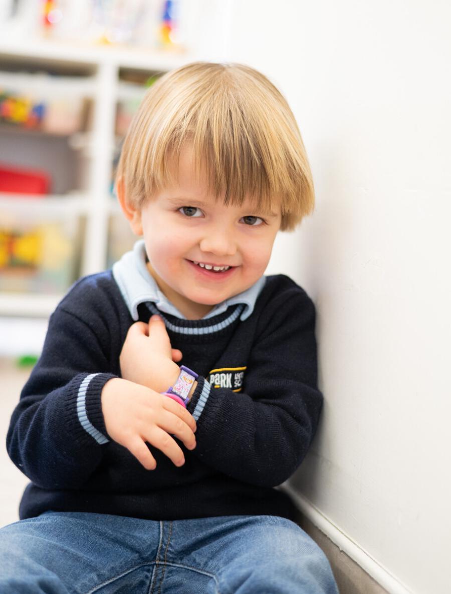 Preschool student smiling