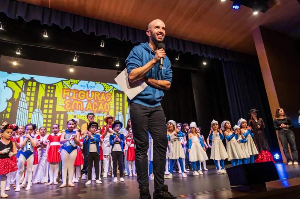 Preschool children in costumes performing on stage
