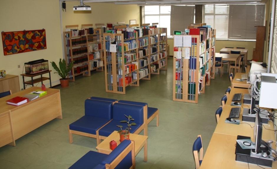 Preschool library with bookshelves and computers