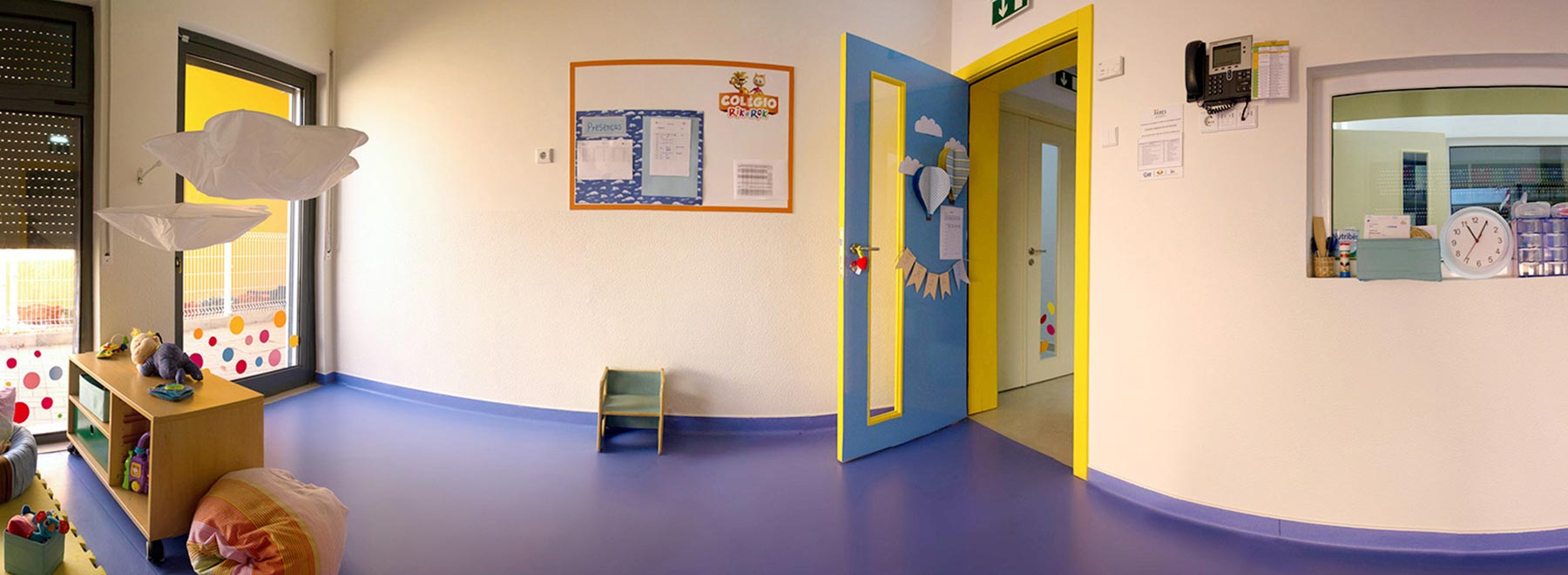 Preschool classroom with colorful decor and toys