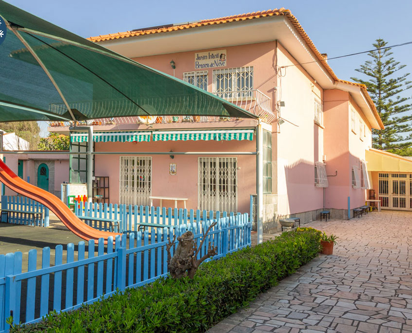 Preschool building exterior with playground
