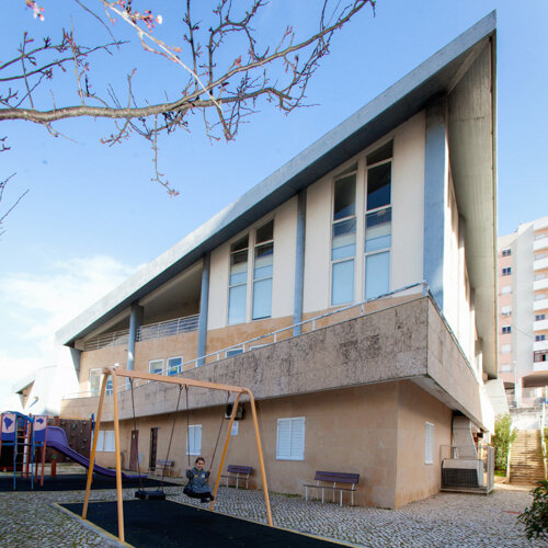 Preschool building with playground equipment