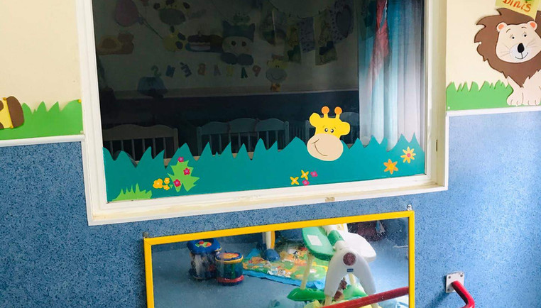 Preschool classroom with animal-themed decorations