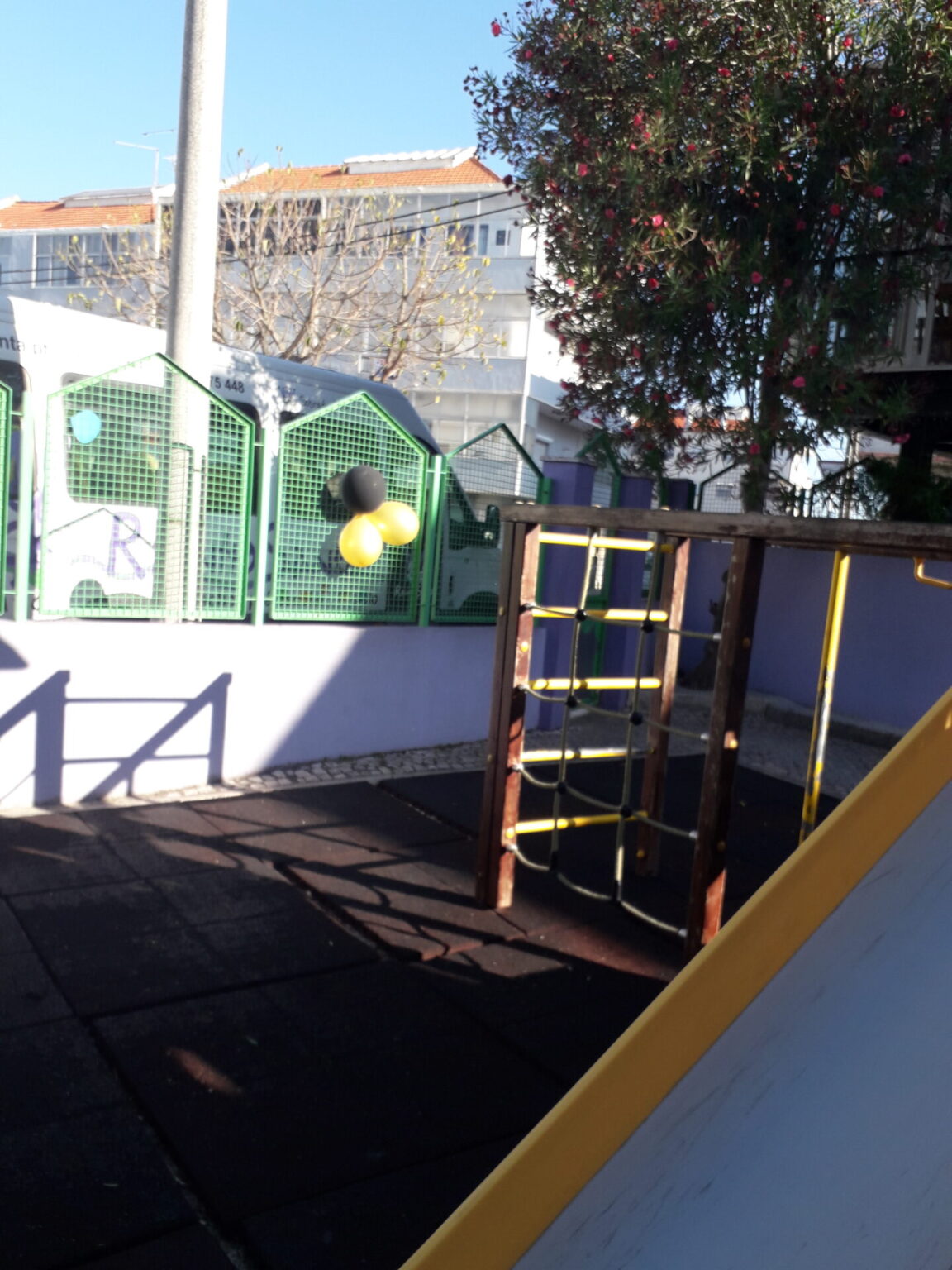 Preschool playground with climbing frame and slide