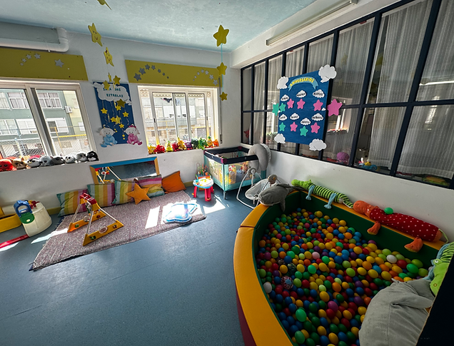 Preschool classroom with colorful toys and play area