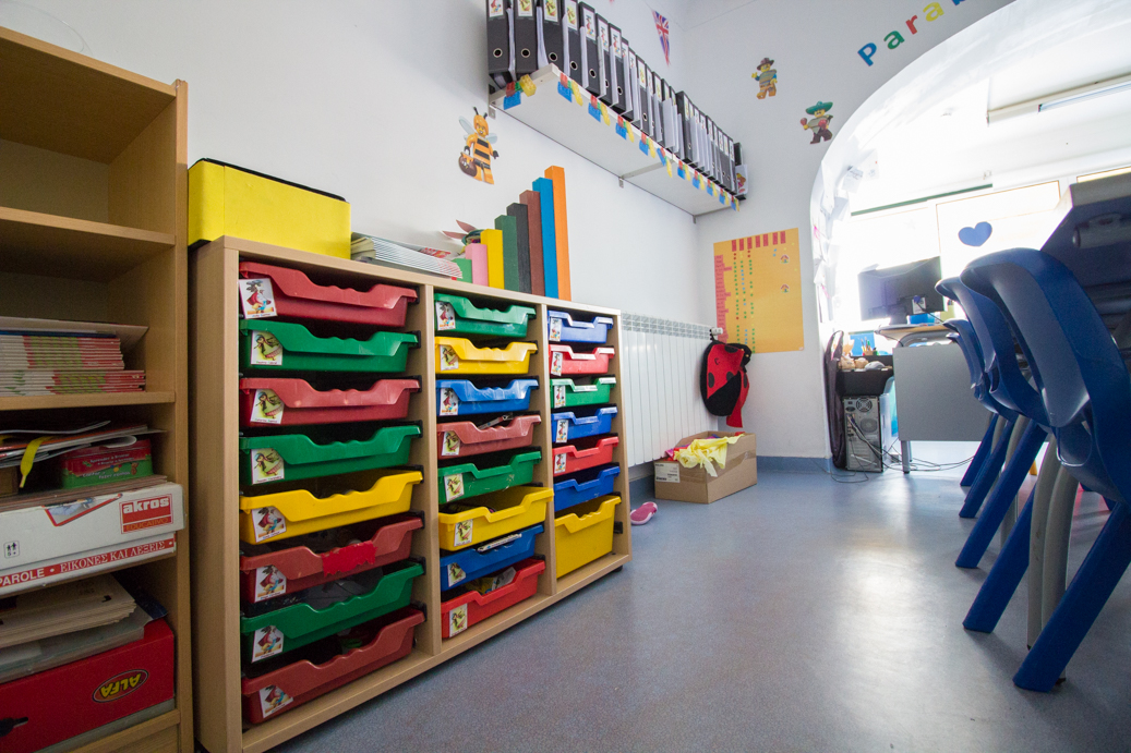 Colorful storage bins in a preschool classroom