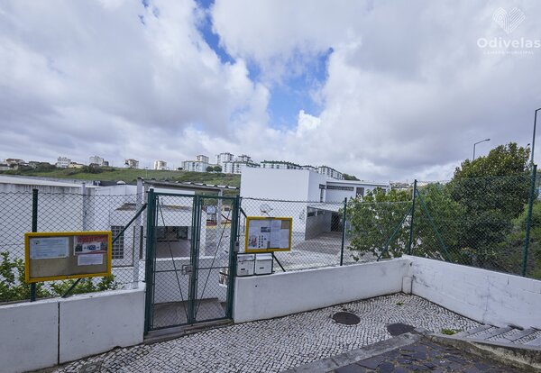 Exterior view of Futura Creche NINONI preschool, showing the entrance gate and building.