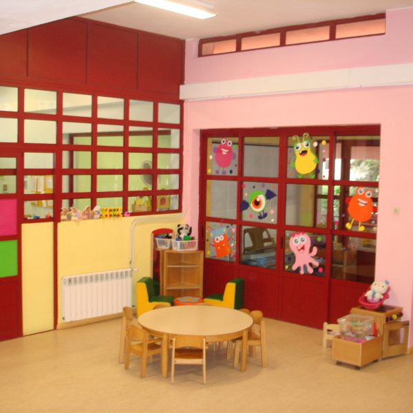 Preschool classroom with colorful furniture and decorations