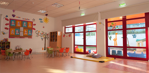 Preschool classroom with colorful decorations and furniture