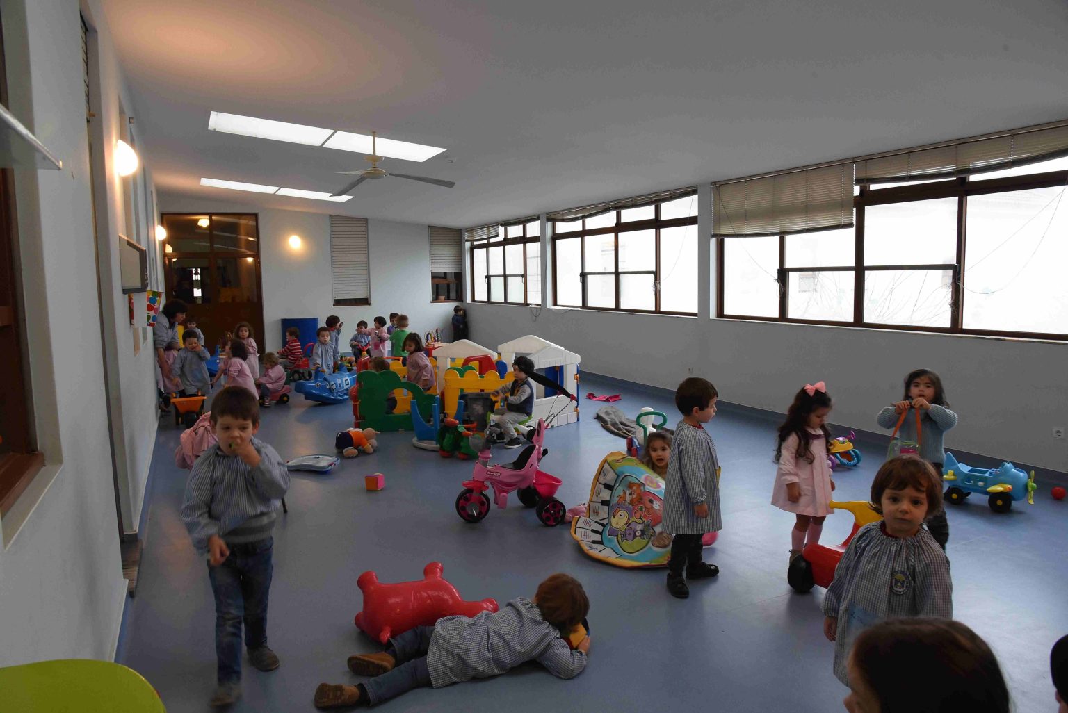 Preschool children playing with toys in a classroom