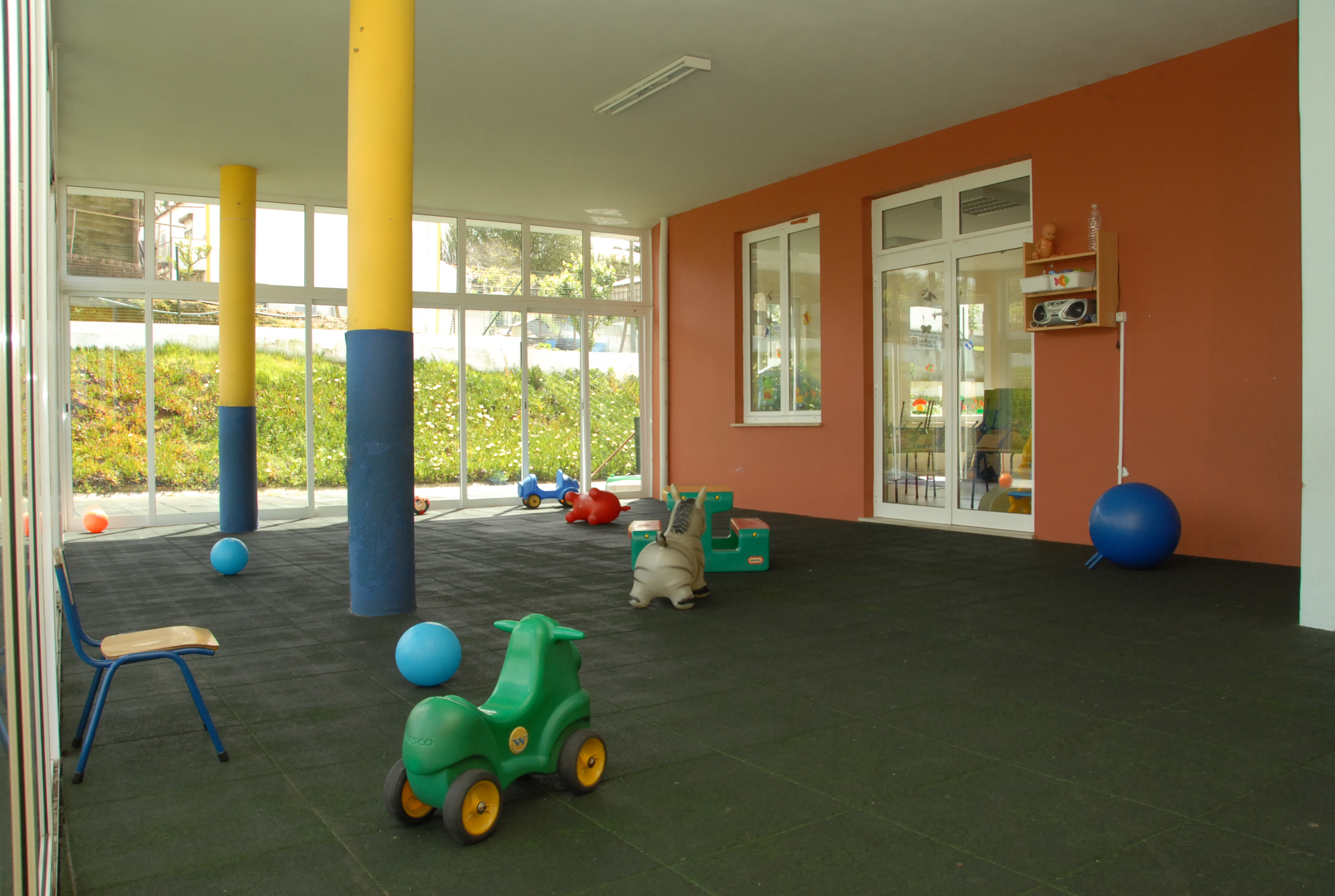 Preschool playground with colorful toys and balls