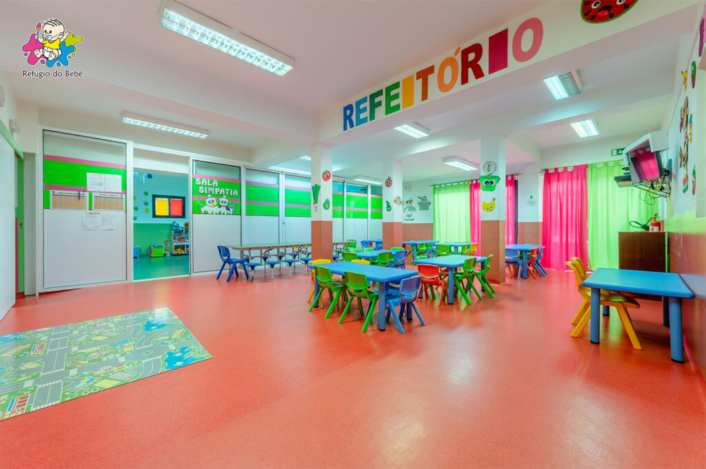 Preschool cafeteria with colorful tables and chairs
