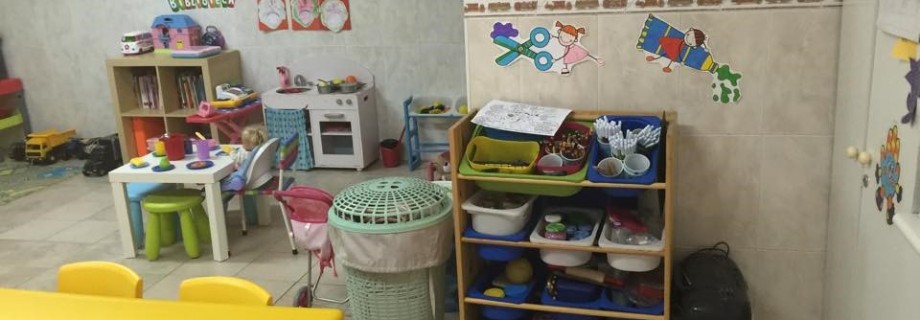 Preschool classroom with colorful toys and learning materials