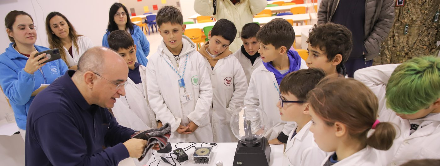 Preschool students participating in a science experiment
