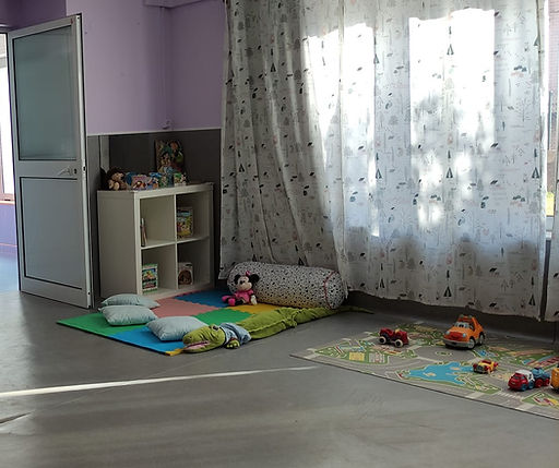 Preschool classroom with toys and play area
