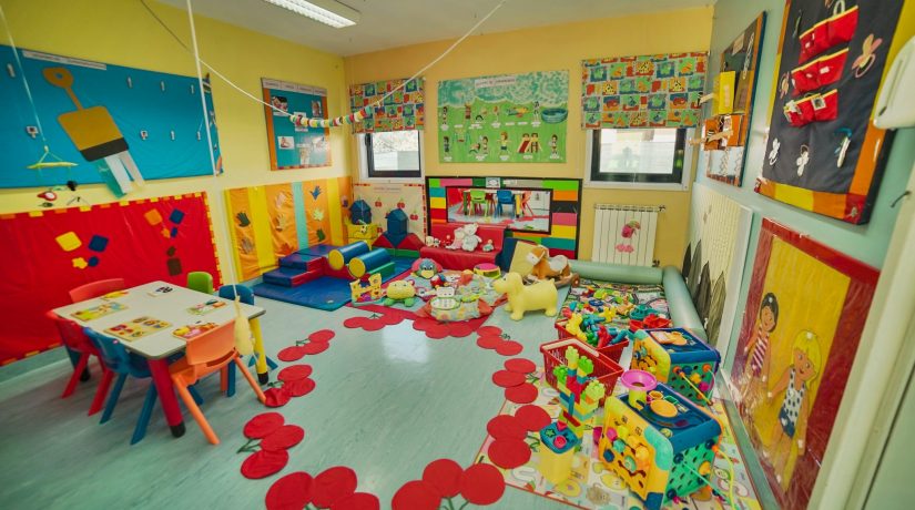 Preschool classroom with colorful toys and learning materials
