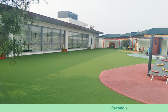 Casa Nossa Senhora de Fátima preschool playground with artificial turf and play structures