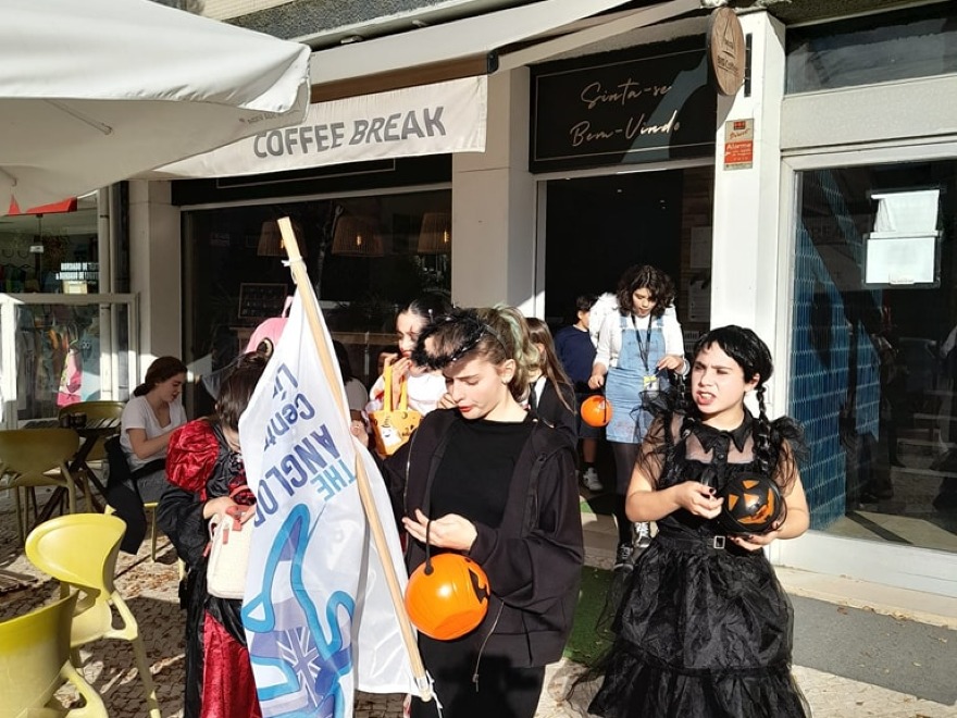 Students in Halloween costumes outside The Anglophil Centre