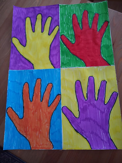 Colorful handprint artwork created by preschool children