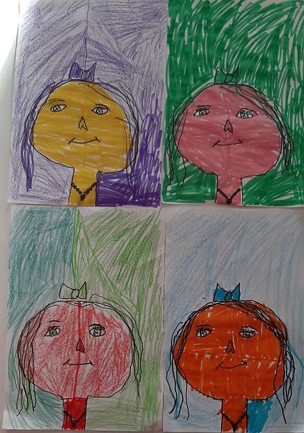 Four colorful self-portraits created by preschool children